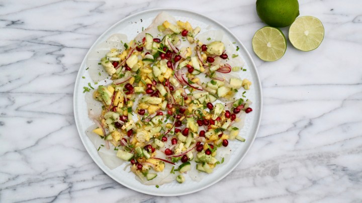 Fish carpaccio with avocado, mango and&nbsp;pomegranate