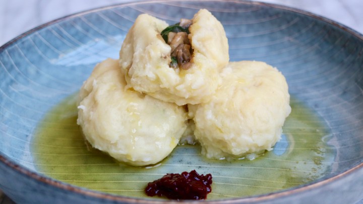 Veggie potato dumplings (Kroppkakor) with mushrooms, shallots and&nbsp;spinach.