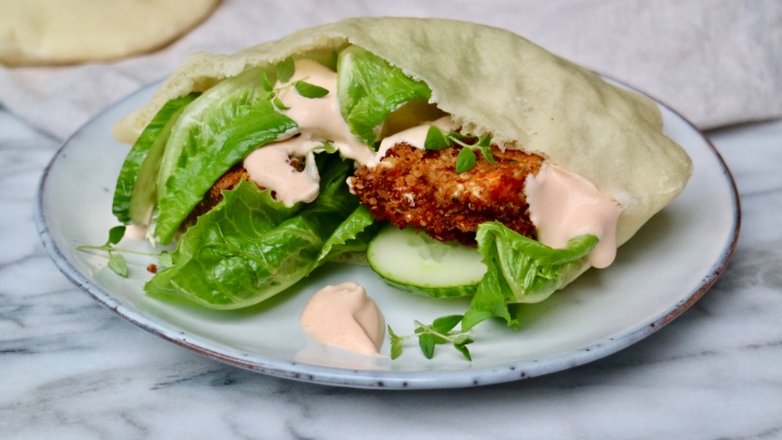 Quinoa burgers in pita bread with sriracha&nbsp;mayo