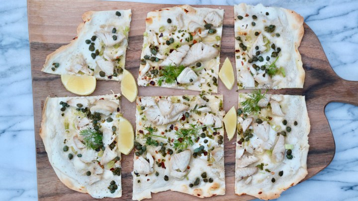 Flammkuchen with chili fish, green onion and&nbsp;capers